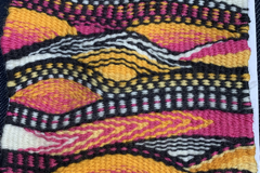 My inspiration for this color scheme was Silvia Hayden’s weaving called “Hurricane”.  We are all as tapestry weavers connected in some way to those who wove before us-I feel especially connected to Silvia’s work. I think our tapestry weaving “ancestors” inform our own work and connect us as a community. I hope you enjoy my first ever postcard exchange weaving.